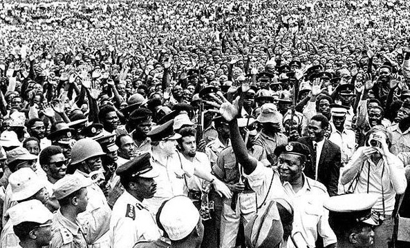 Idi Amin celebrating with a crowd after overthrowing Milton Obote on January 25, 1971