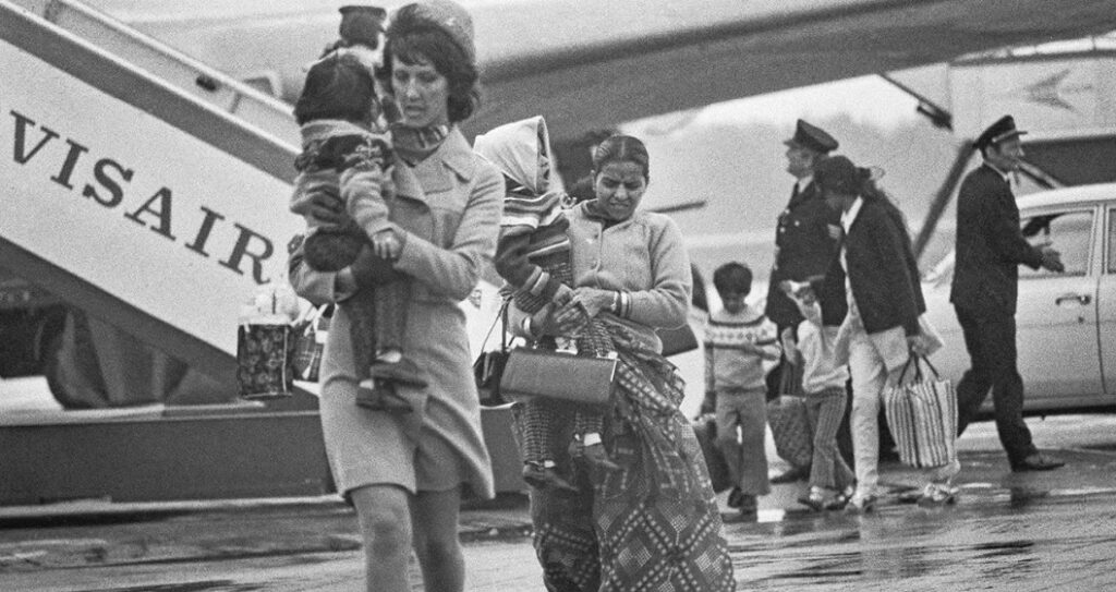 Asian Ugandans disembark from a Servisair flight in the UK after being expelled by Idi Amin