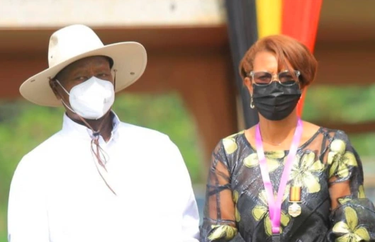 Dr. Lilly Ajarova, newly appointed Senior Presidential Advisor on Tourism, posing with President Yoweri Museveni after her appointment ceremony.