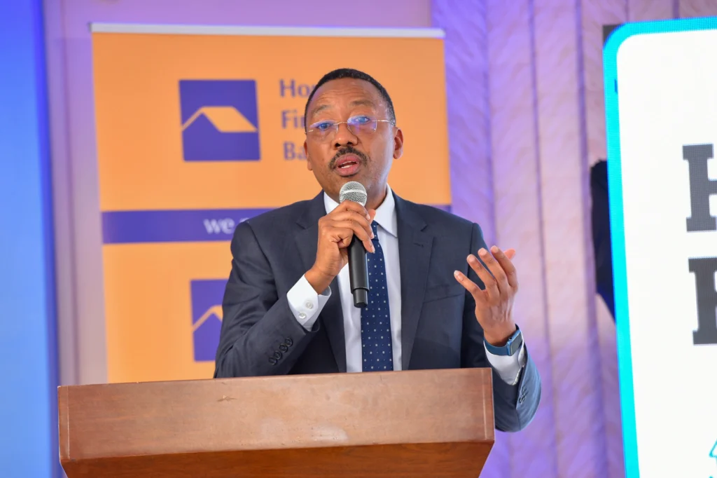 Michael Mugabi, the Managing Director of Housing Finance Bank giving a speech during the event