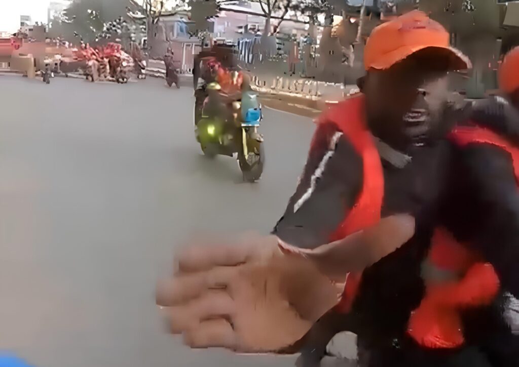 A guy snatching a phone in kampala