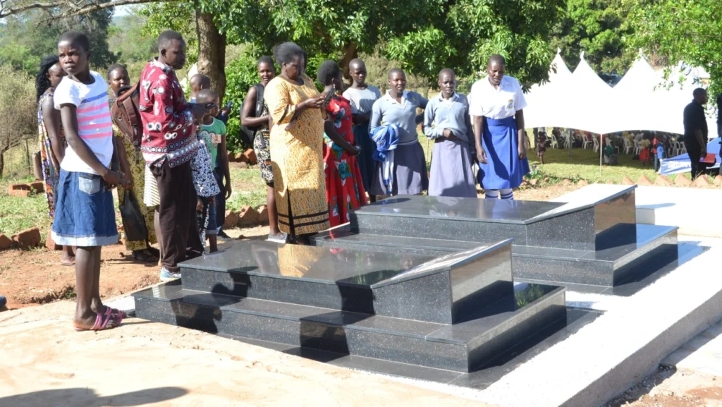 People gathered around Janani Luwum’s grave in Mucwini, Kitgum, saying prayers to honor his legacy and sacrifice.