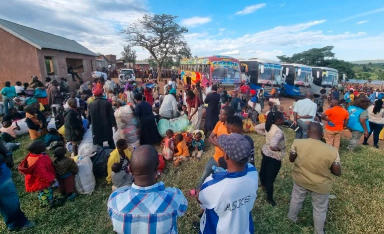 Congolese refugees arrive at the Songa landing site in Uganda, seeking safety from conflict in the DRC.