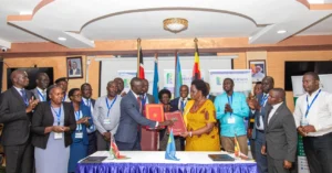 Ugandan and Kenyan officials at the Angololo project signing ceremony in Busia