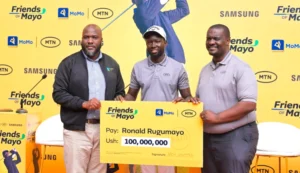 Ronald Rugumayo poses with MTN Uganda team after Shs 100M sponsorship reveal