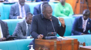 Gen. David Muhoozi addressing Parliament on ID renewal plans
