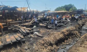 Destroyed timber yards and woodworking machinery after Ndeeba fire