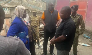 One of the suspects being interrogated by UNBS surveillance offer Sarah Nantongo