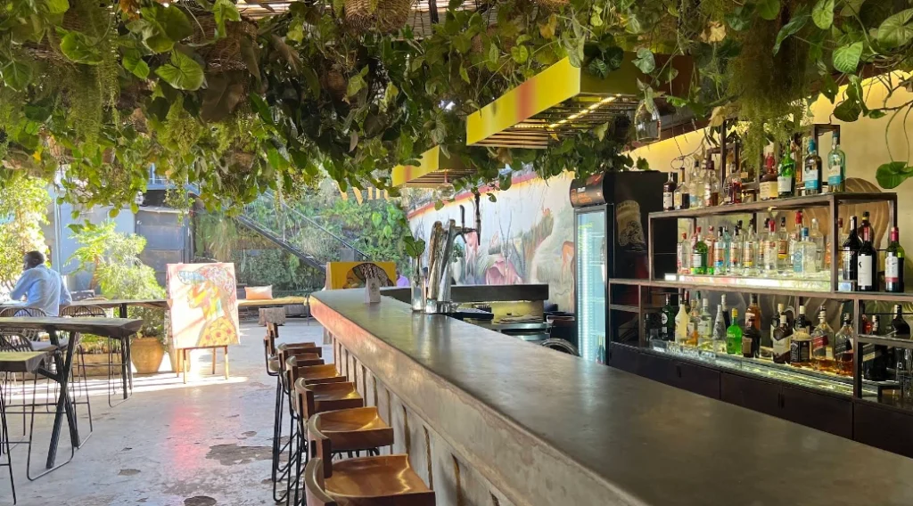 Wild Coffee Bar in Kampala, a unique café that transforms into a vibrant nightlife spot with great coffee and live music.