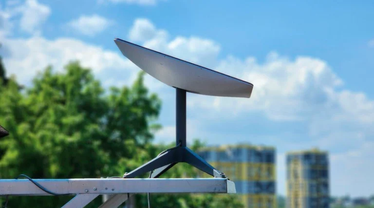 Starlink satellite dish setup in a remote Ugandan village