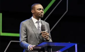 Apostle Grace Lubega addressing congregants at a Phaneroo service in Naguru
