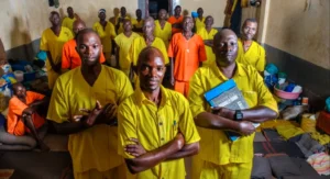 Overcrowded Ugandan prison cell highlighting poor ventilation and congestion