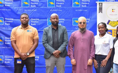 John Baptist Kaweesi-Head of Mortgage and Consumer Banking at Housing Finance Bank (Second left) and Mufaddal Yeolawala Managing Director of Universal M Enterprises (second right) together with team members